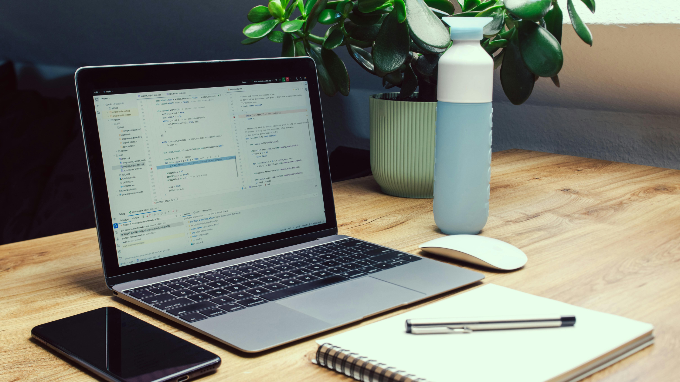 Minimal AI tool stack — desk with laptop showing two AI apps